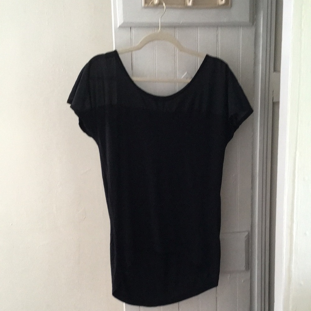 Black blouse with sheer top and low high bottom